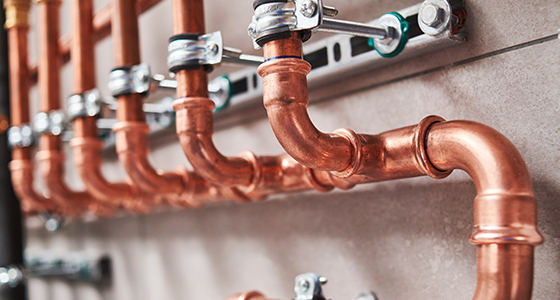 copper pipes for heated water in a boiler system