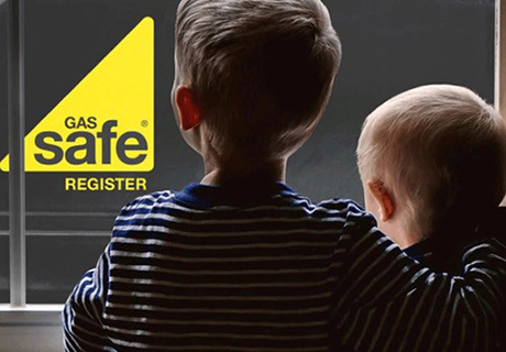 two children looking at a van parked outside through a window with the Gas Safe Register logo on the side